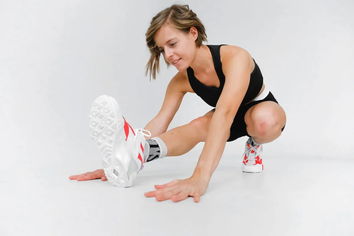 An athlete stretching before a workout.